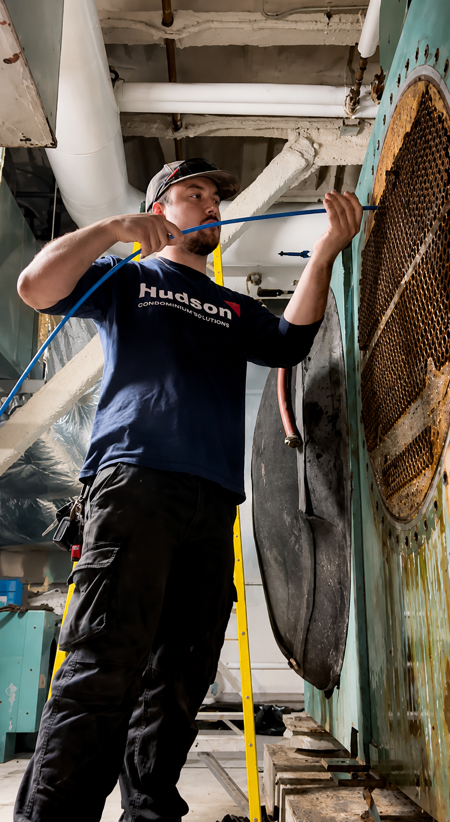 Hudson technician performing chiller maintenance