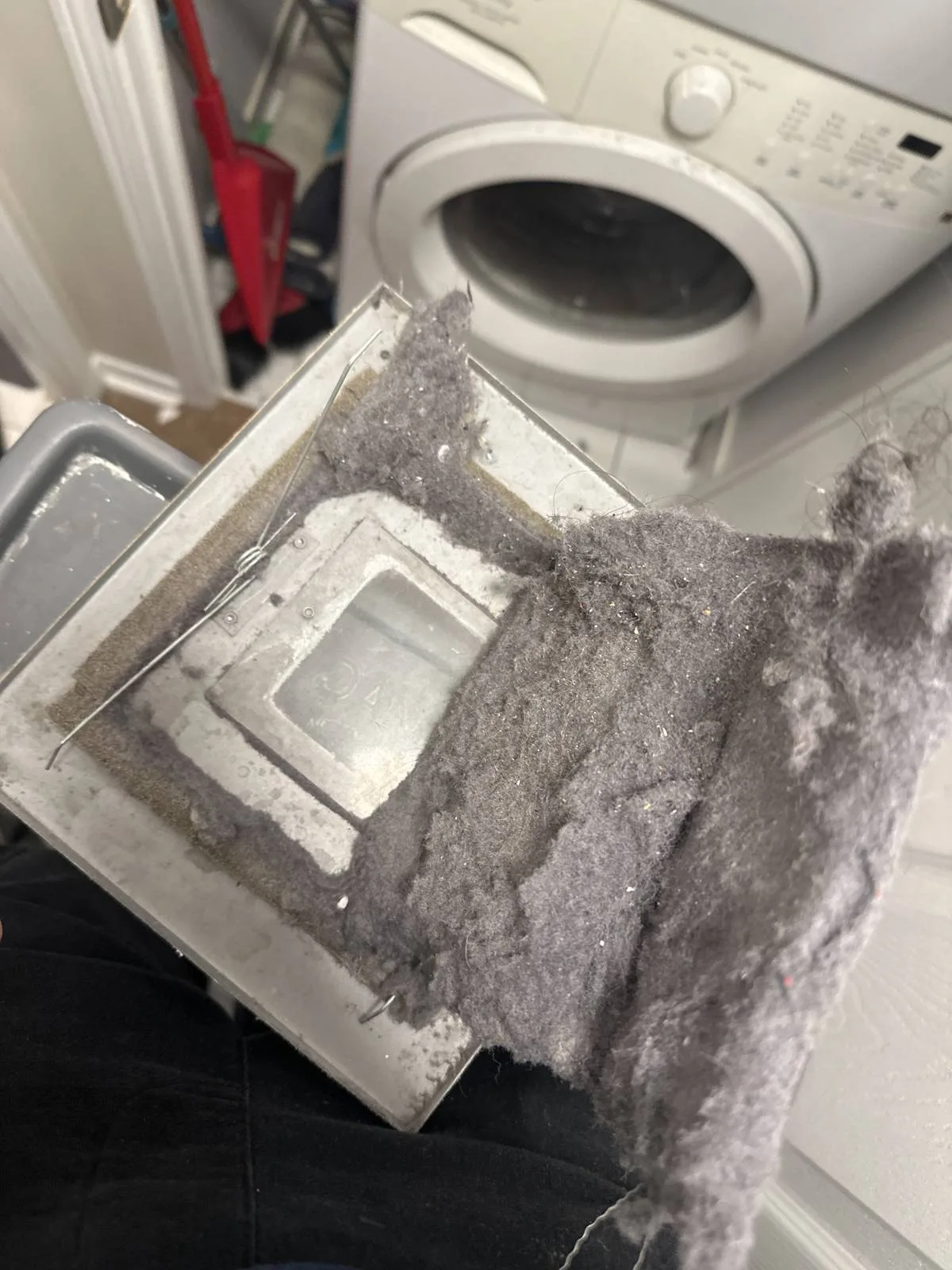Dirty dryer vent showing lint buildup