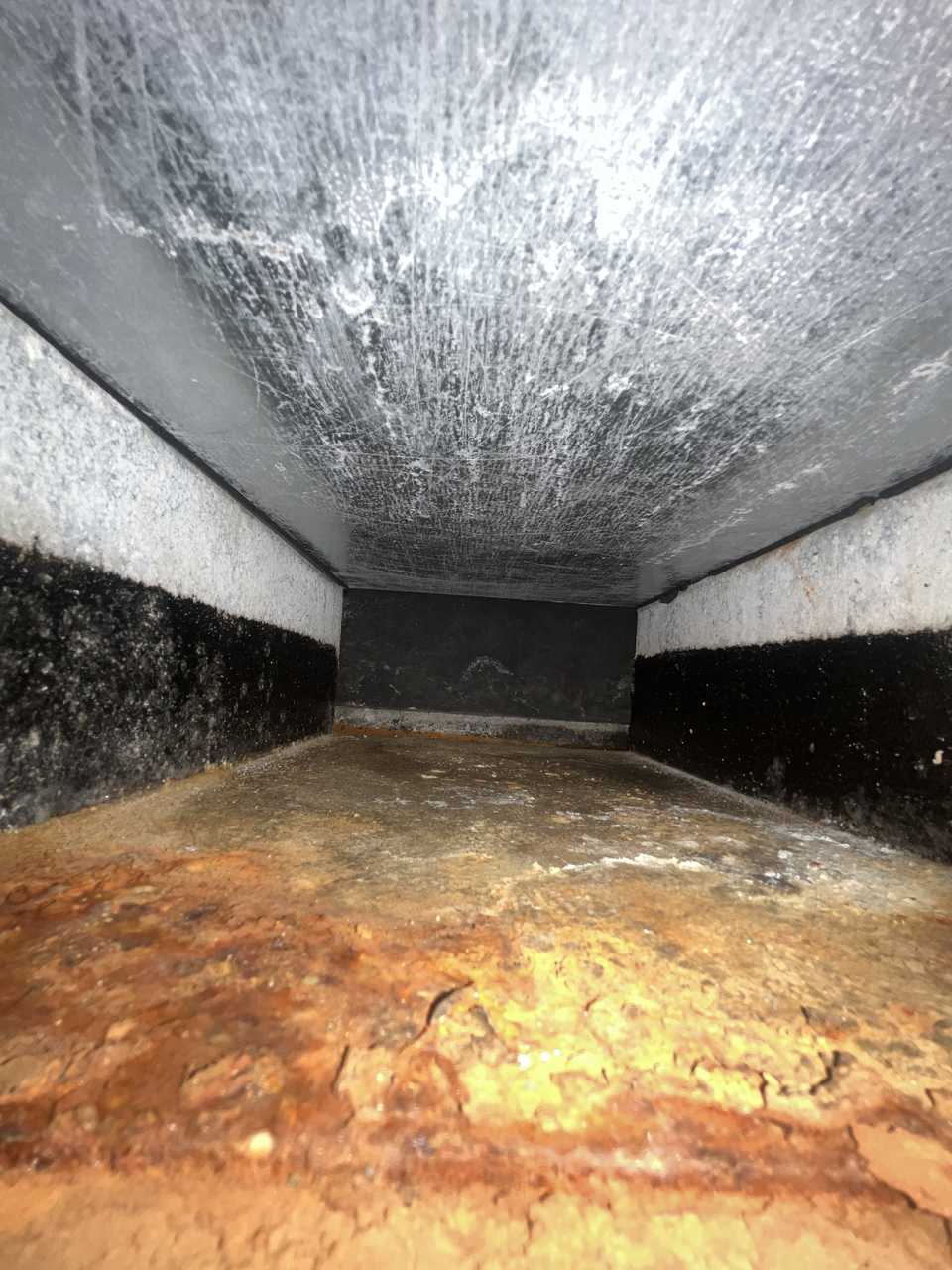 Rusted clogged drain pan